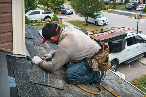 Professional Roofing technician working in Shelby, MI